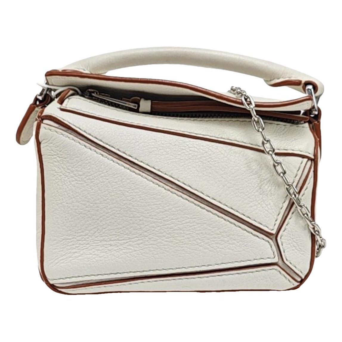 Puzzle leather handbag