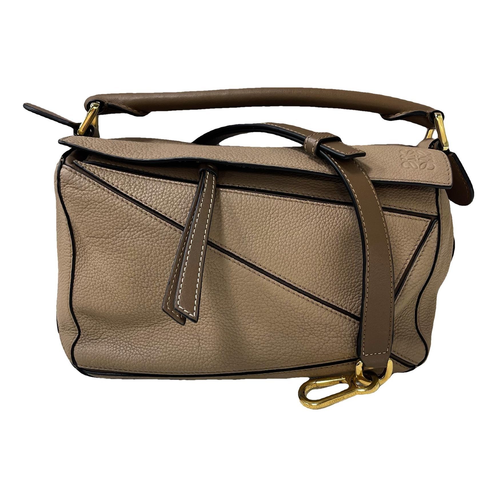 Puzzle leather handbag