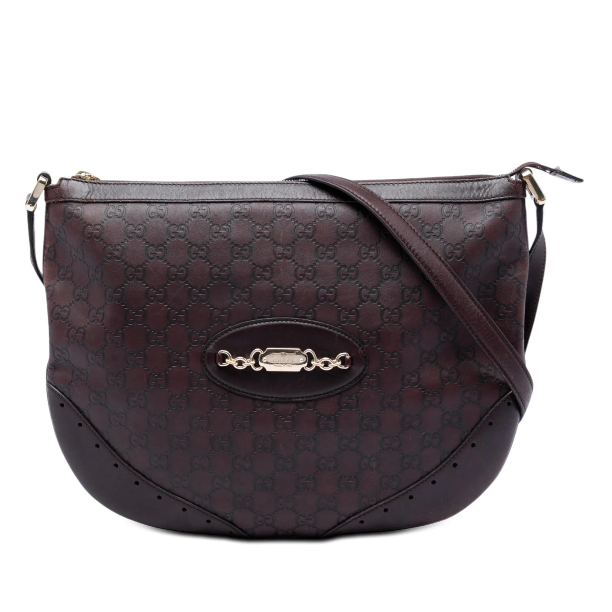Punch leather crossbody bag
