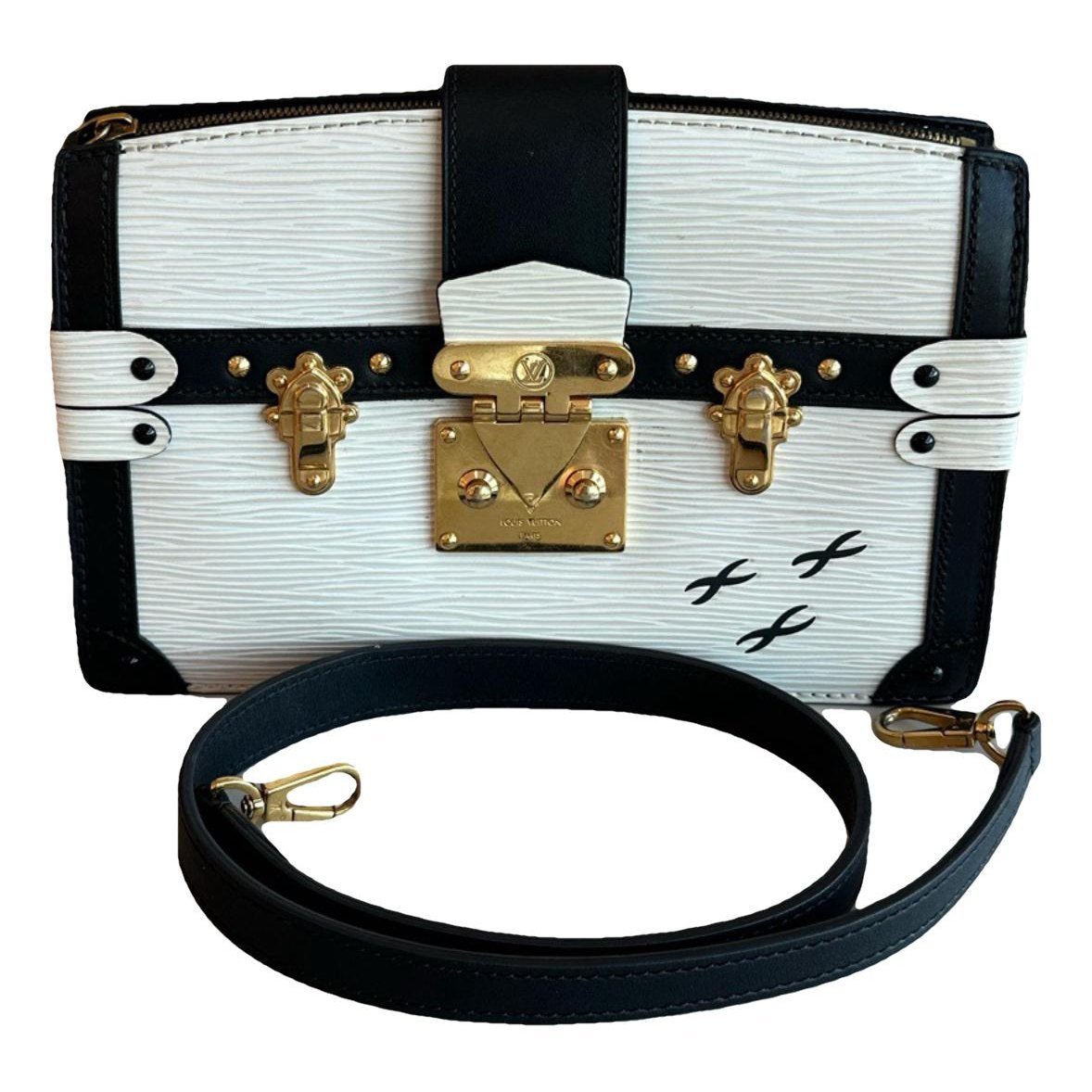 Pochette Trunk leather handbag
