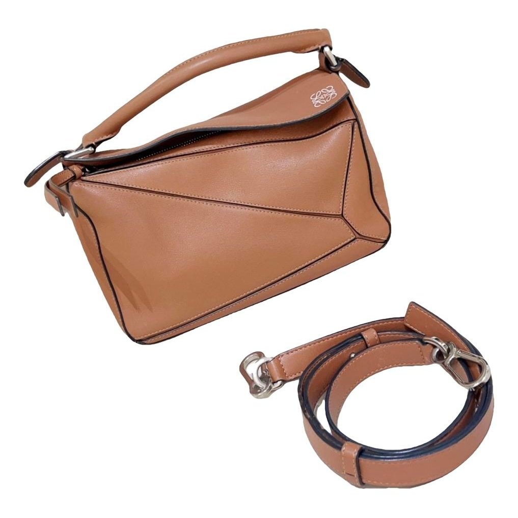 Puzzle leather handbag