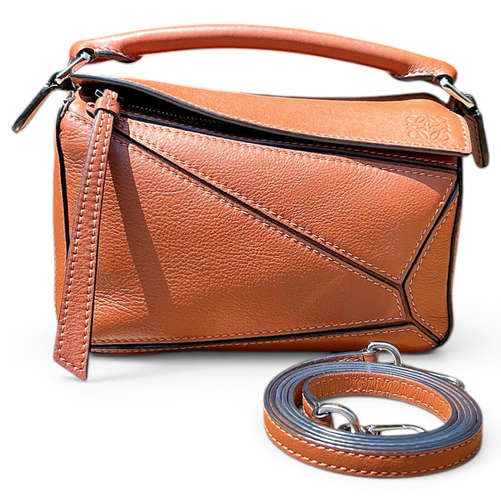 Puzzle leather handbag