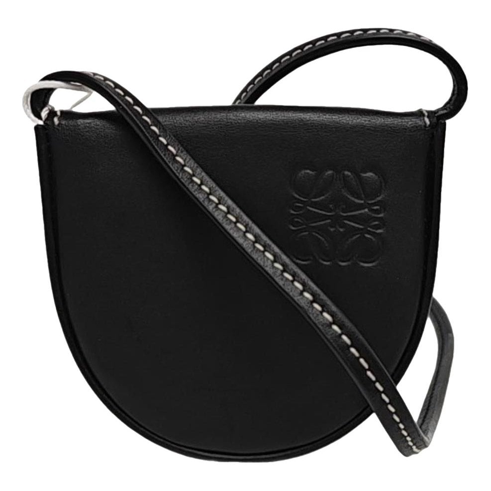 Heel leather handbag