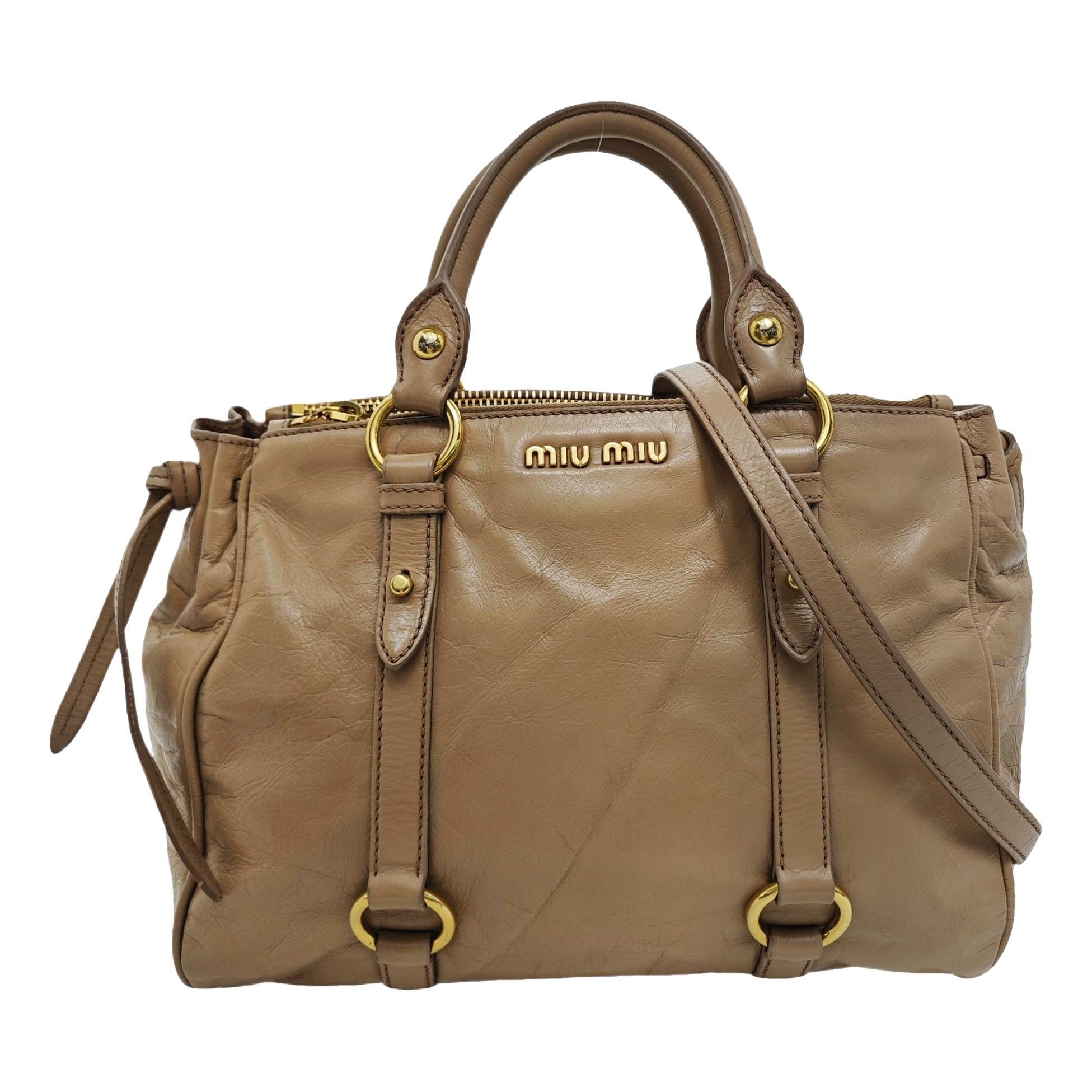 Bow bag leather handbag