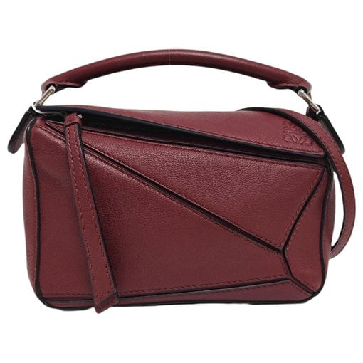 Puzzle leather handbag