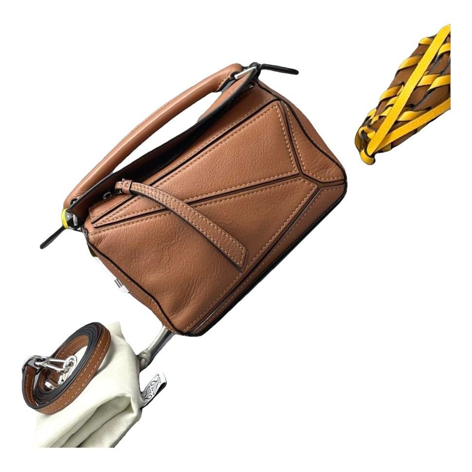 Puzzle leather handbag