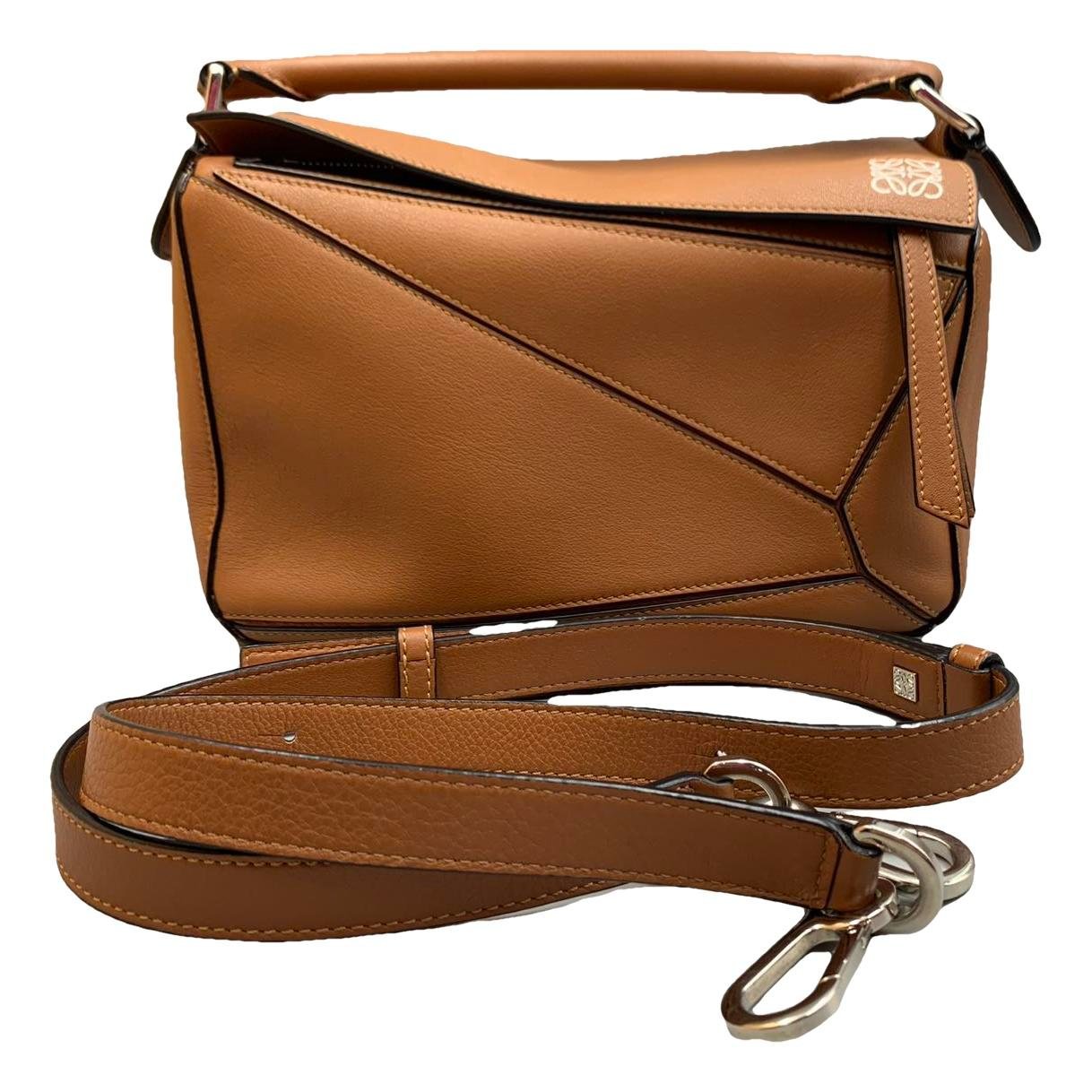 Puzzle leather handbag