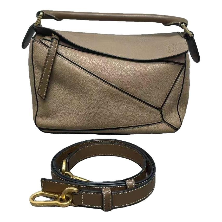 Puzzle leather handbag