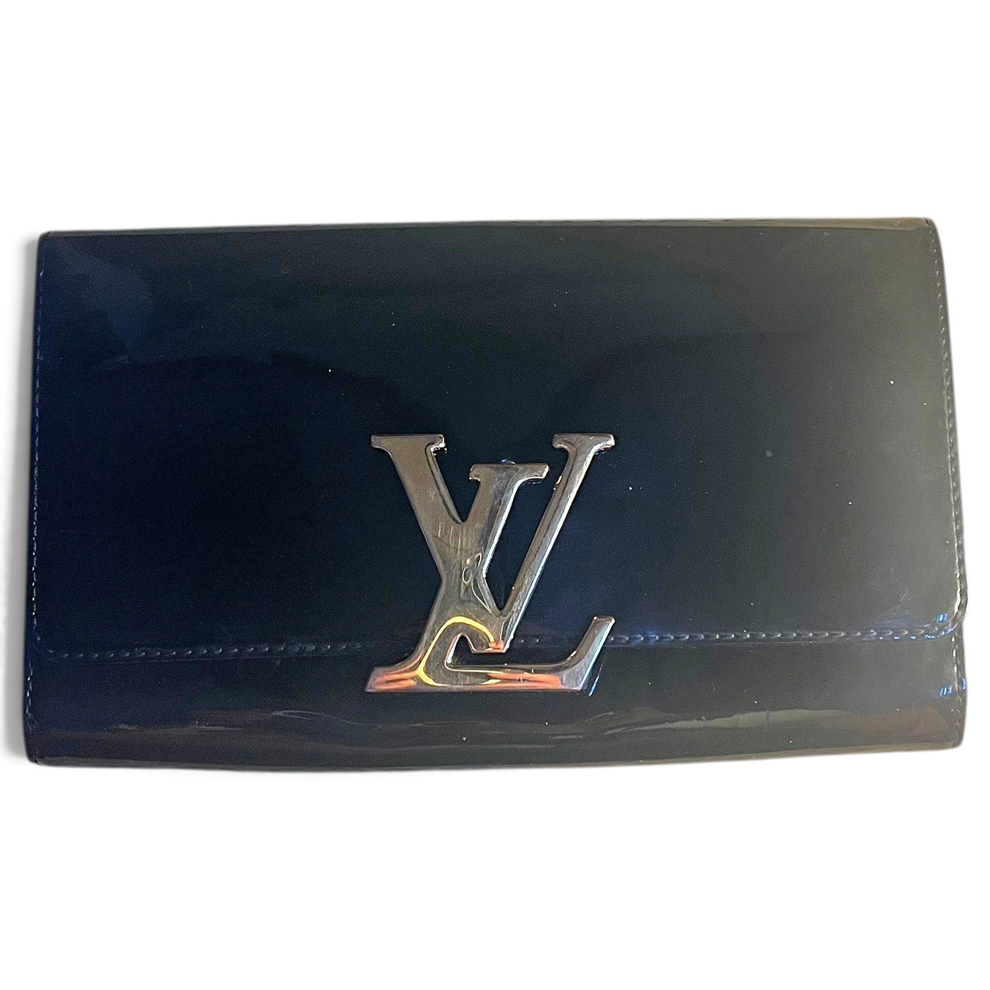 Patent leather clutch bag