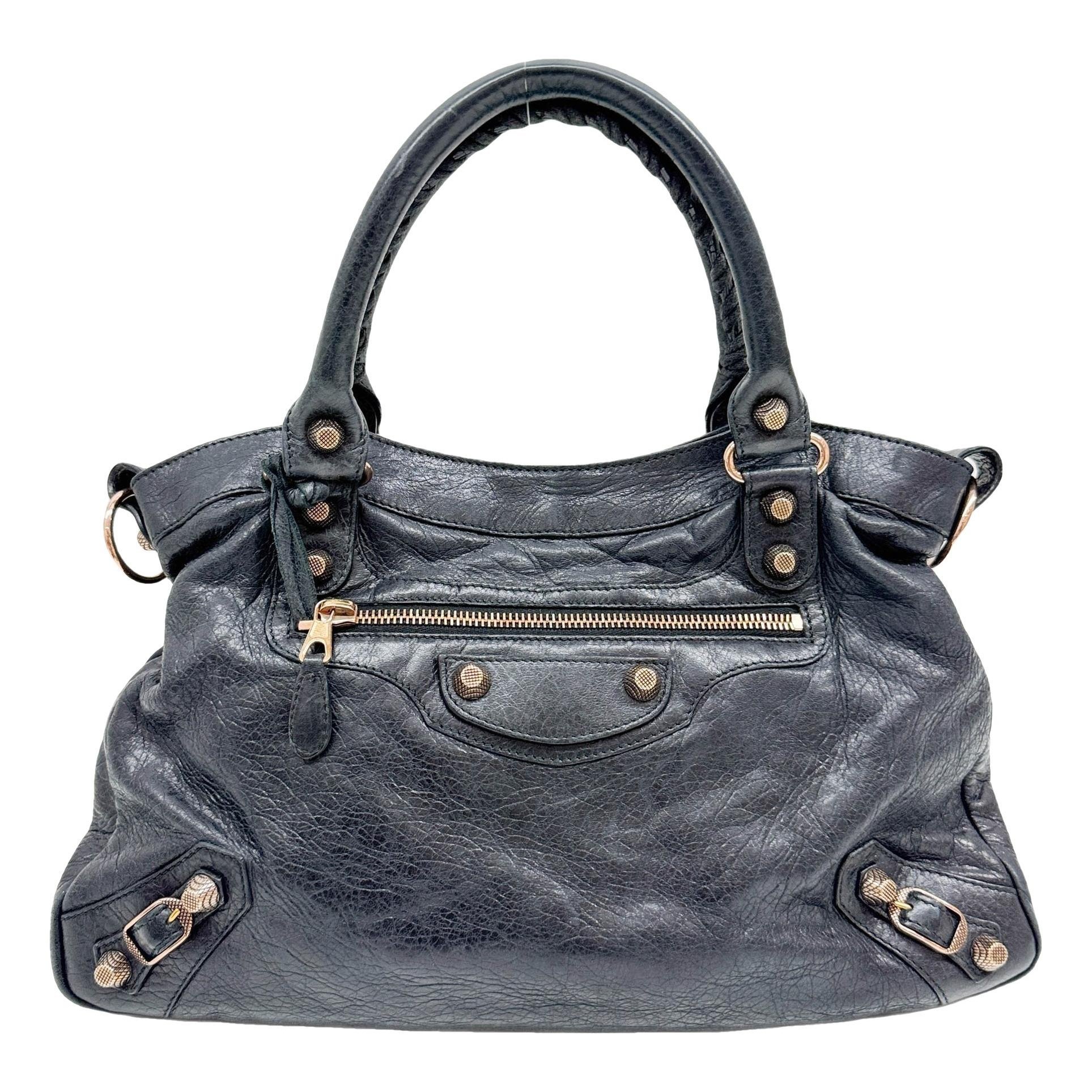 First leather handbag