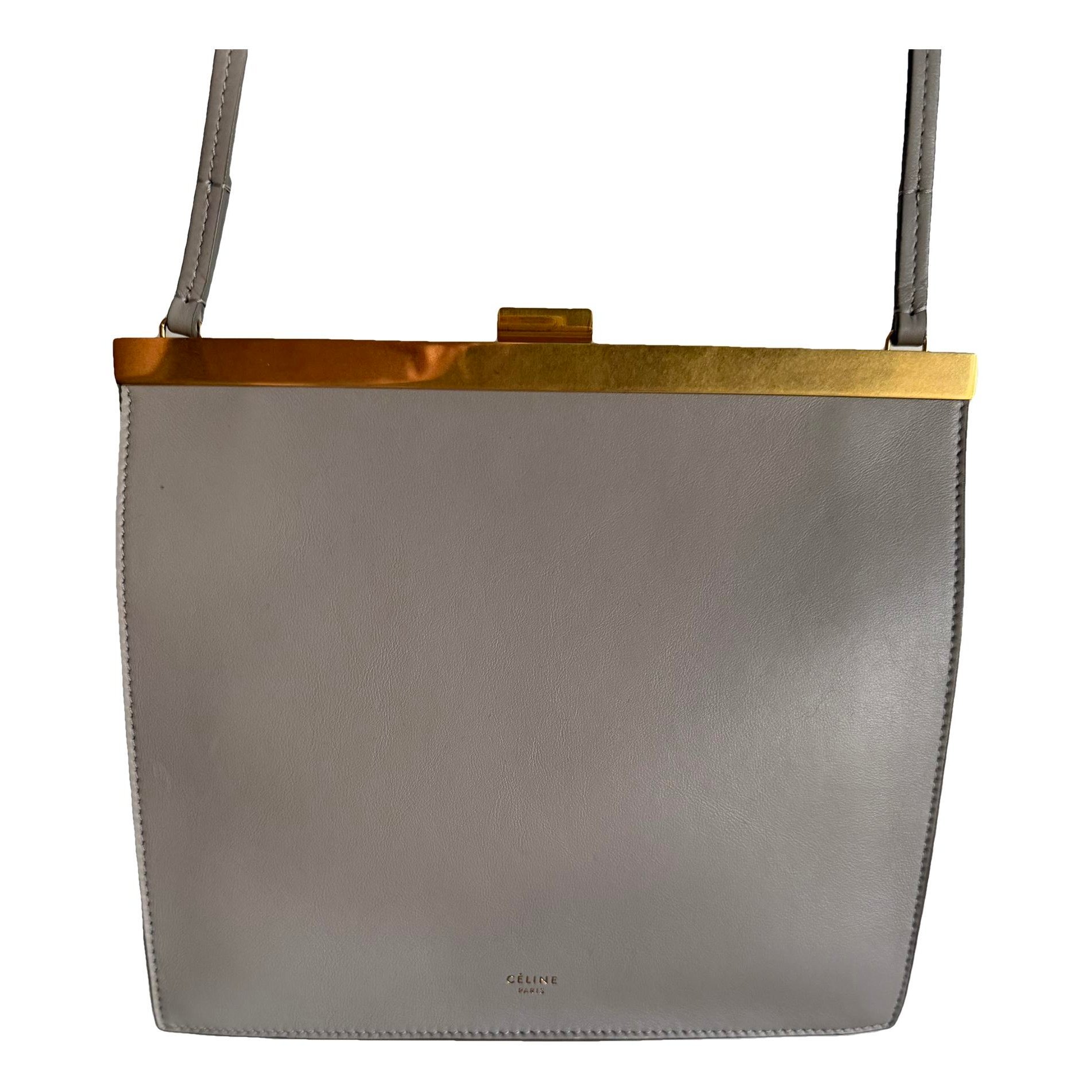 Clasp leather handbag