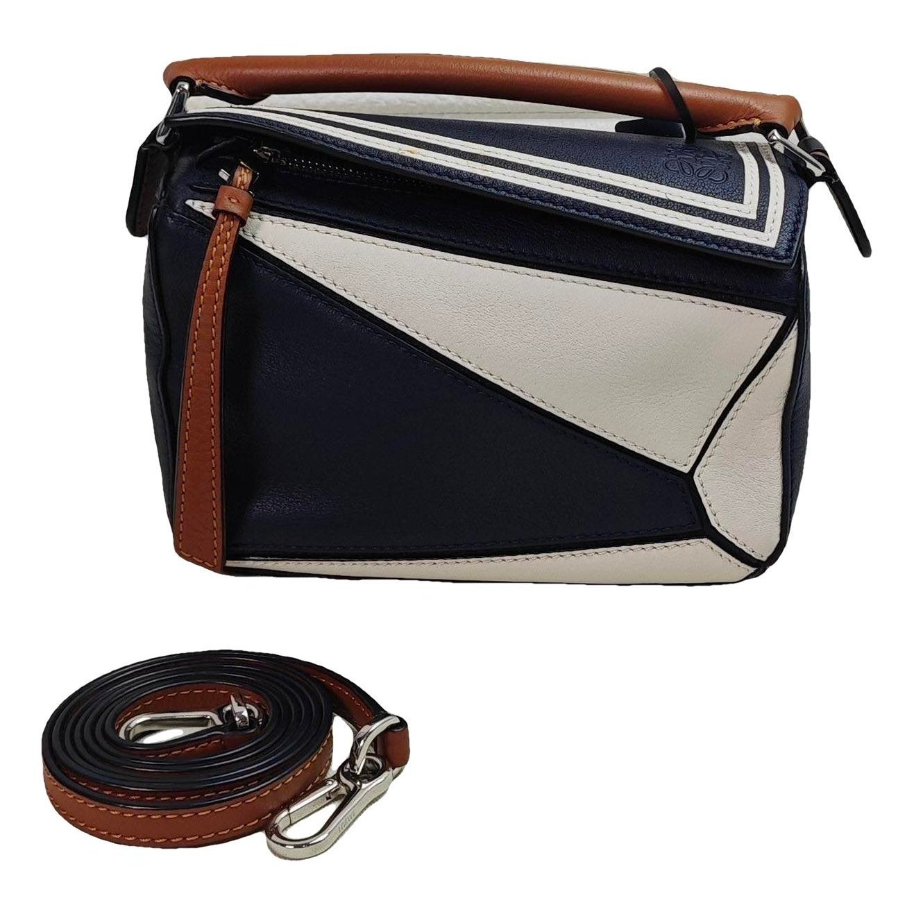 Puzzle leather handbag