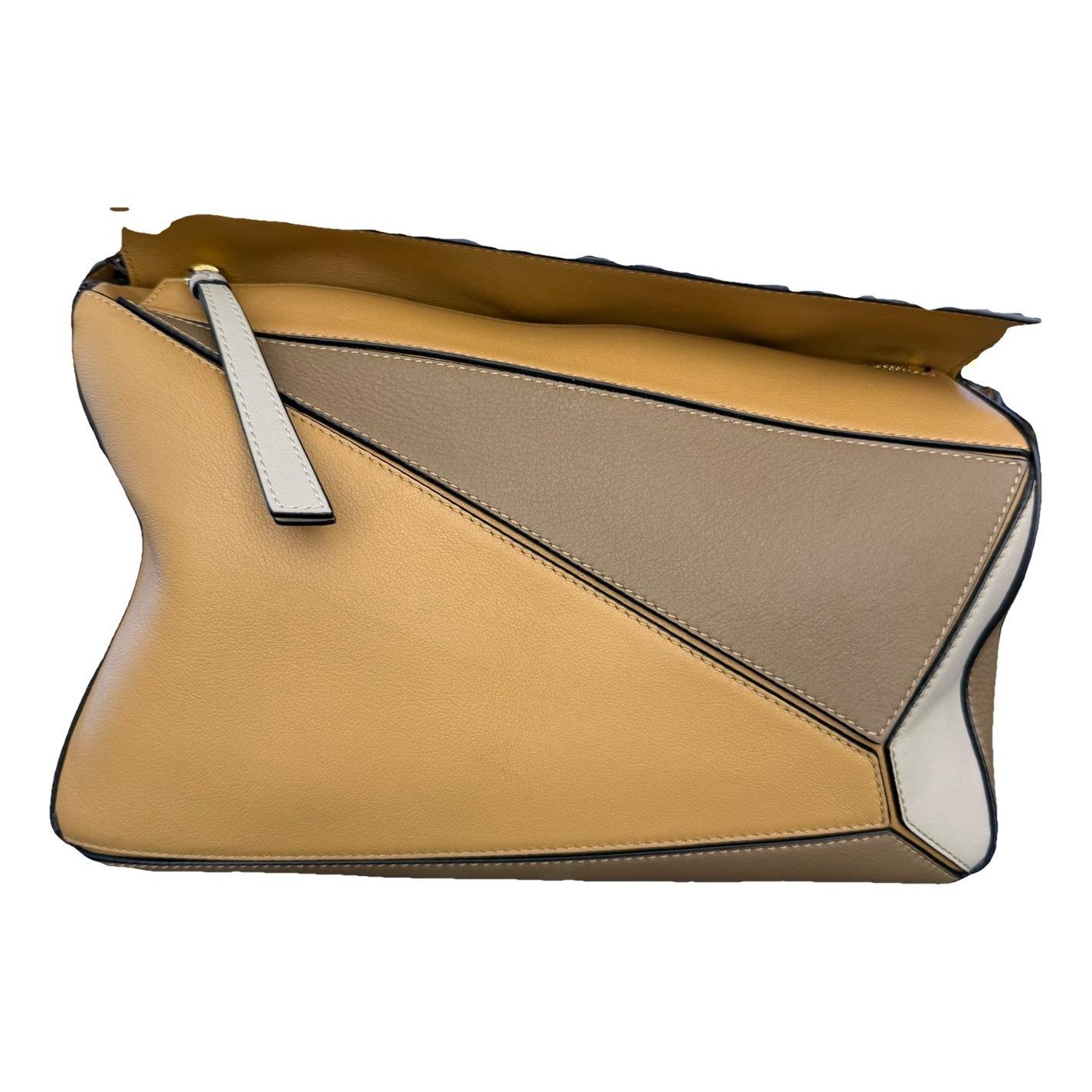 Puzzle leather handbag