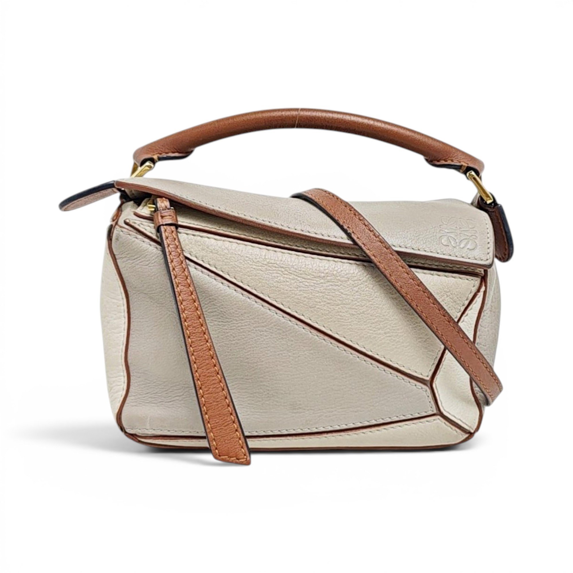 Puzzle leather handbag