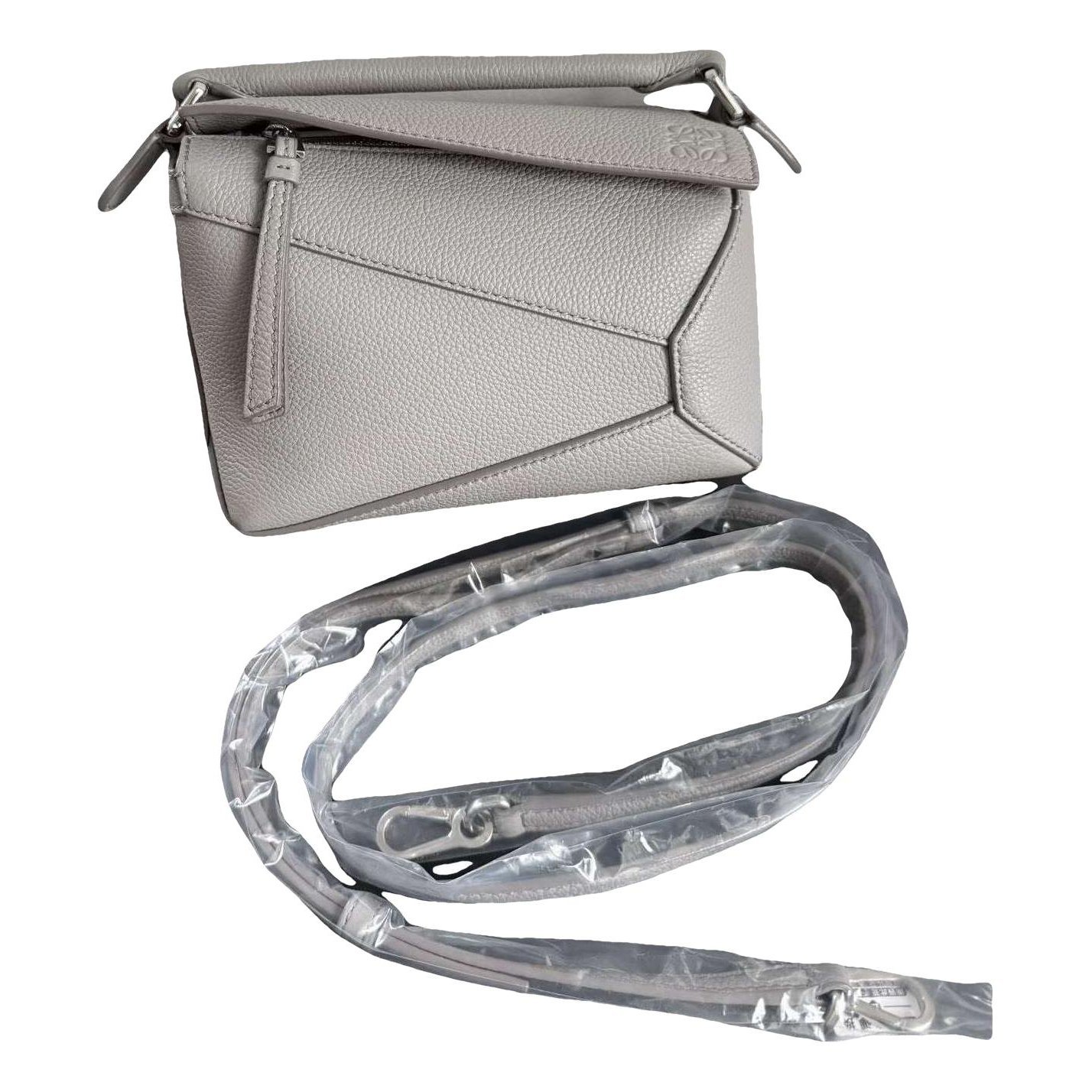 Puzzle leather handbag