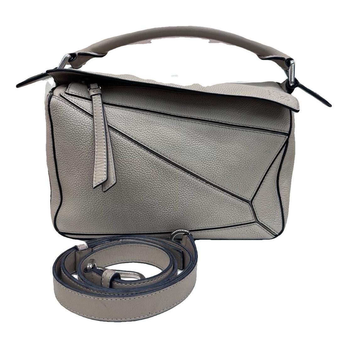 Puzzle leather handbag