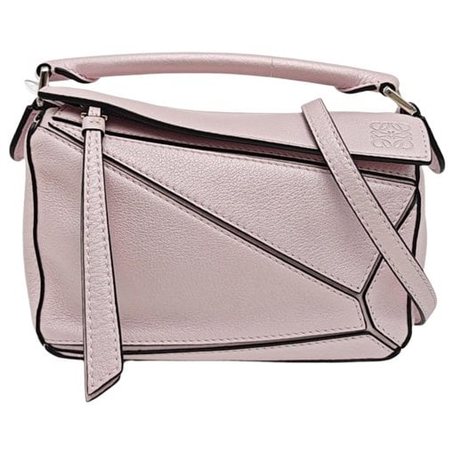 Puzzle leather handbag