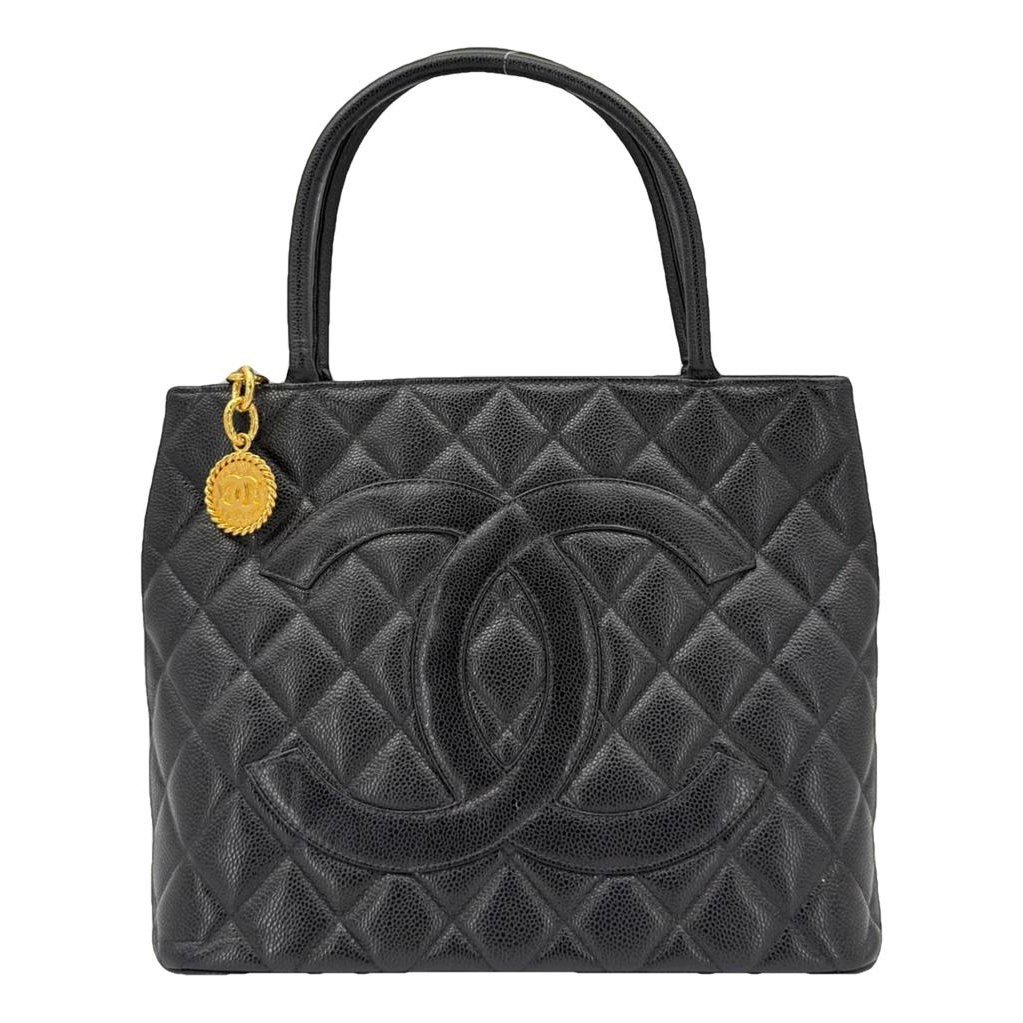 Médaillon leather handbag