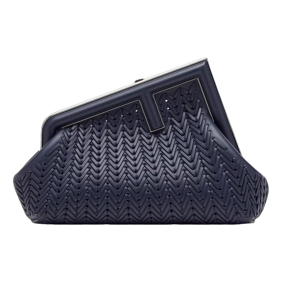First leather handbag