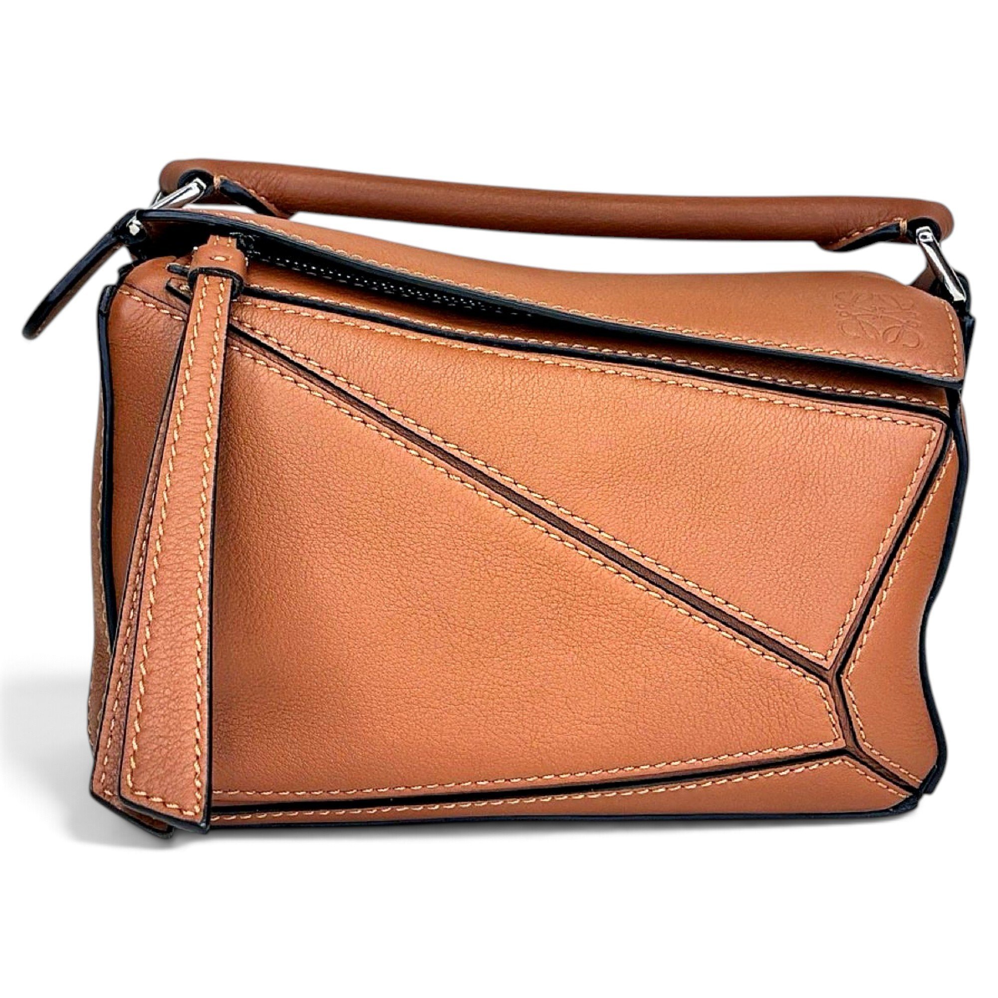 Puzzle leather handbag