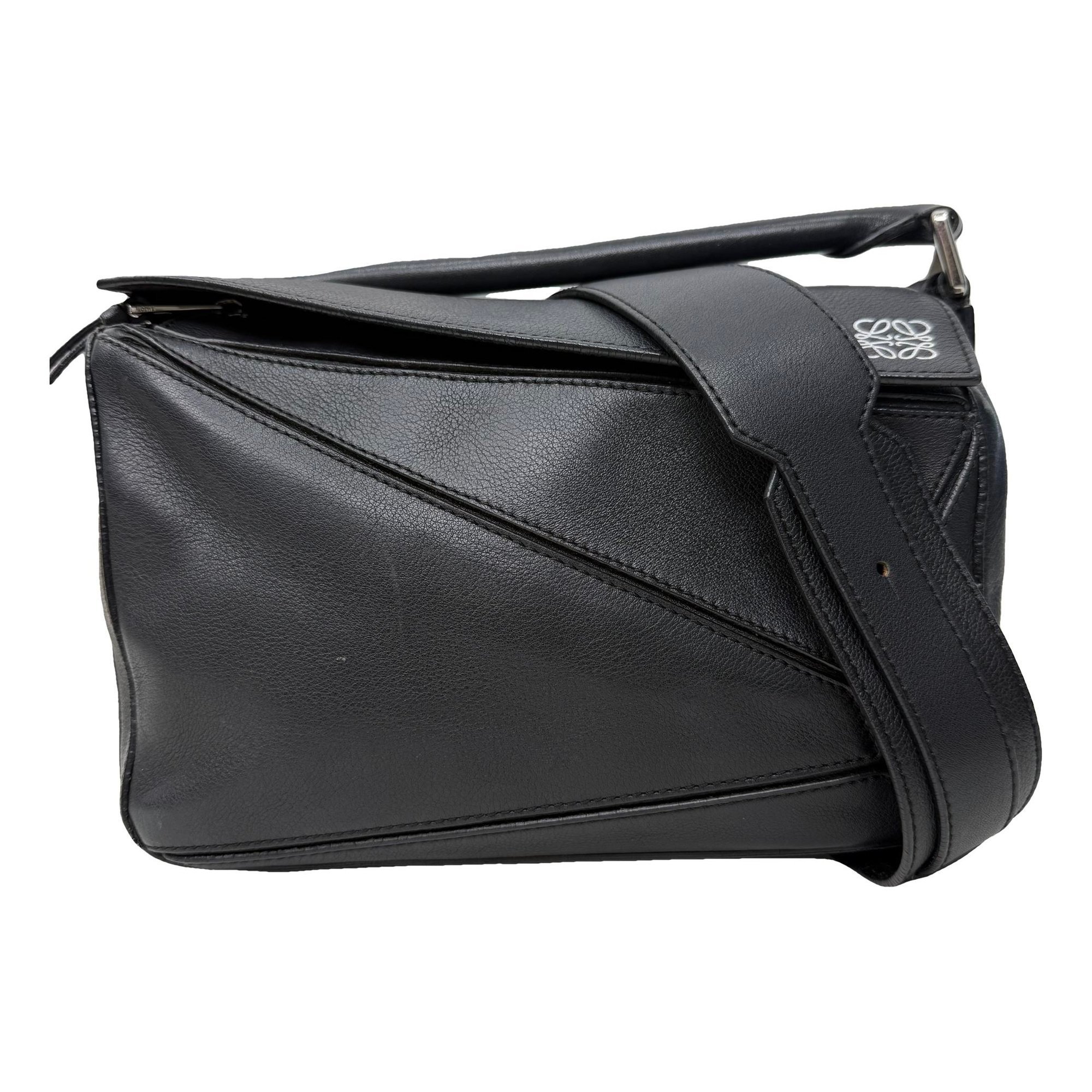 Puzzle leather handbag