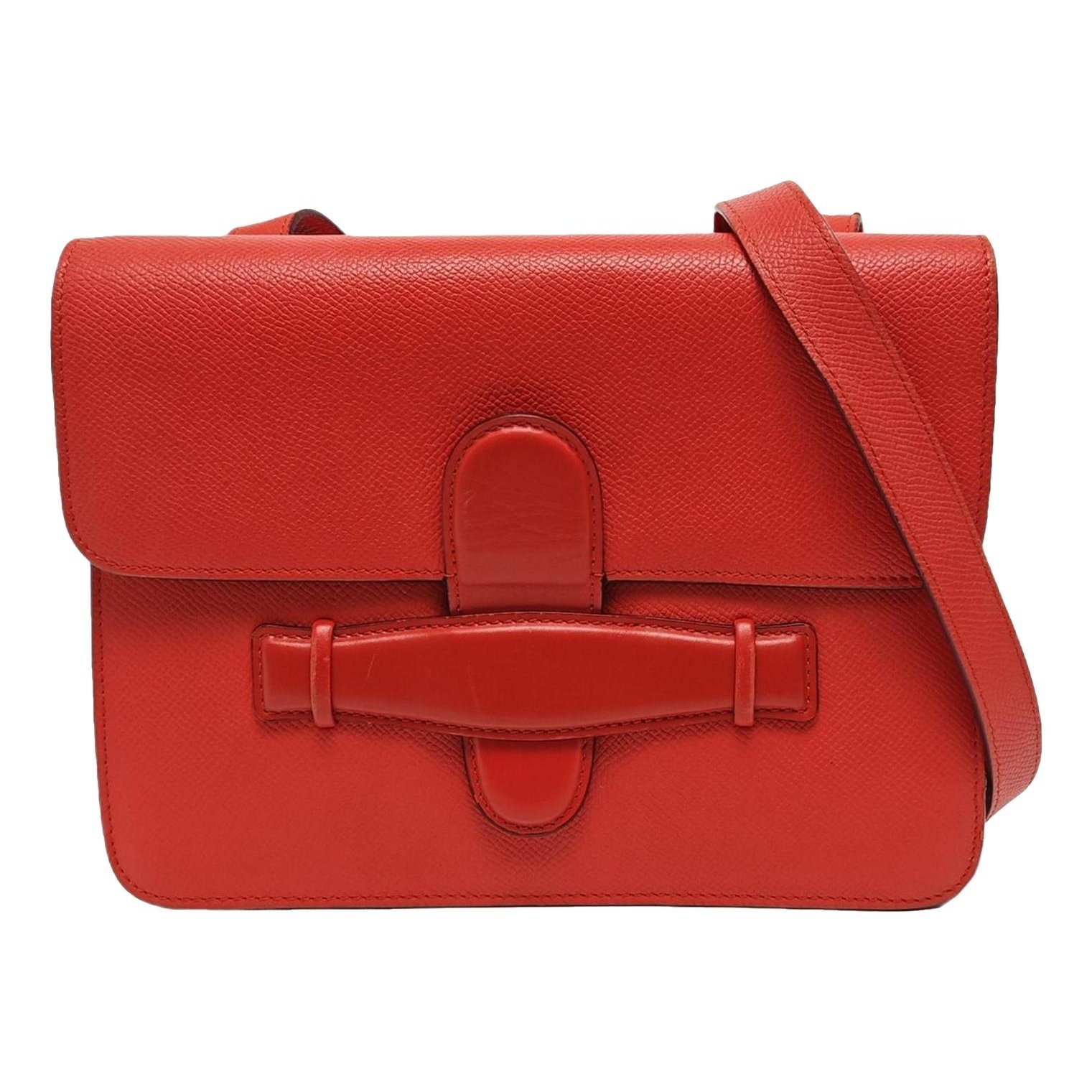 Symmetrical leather handbag