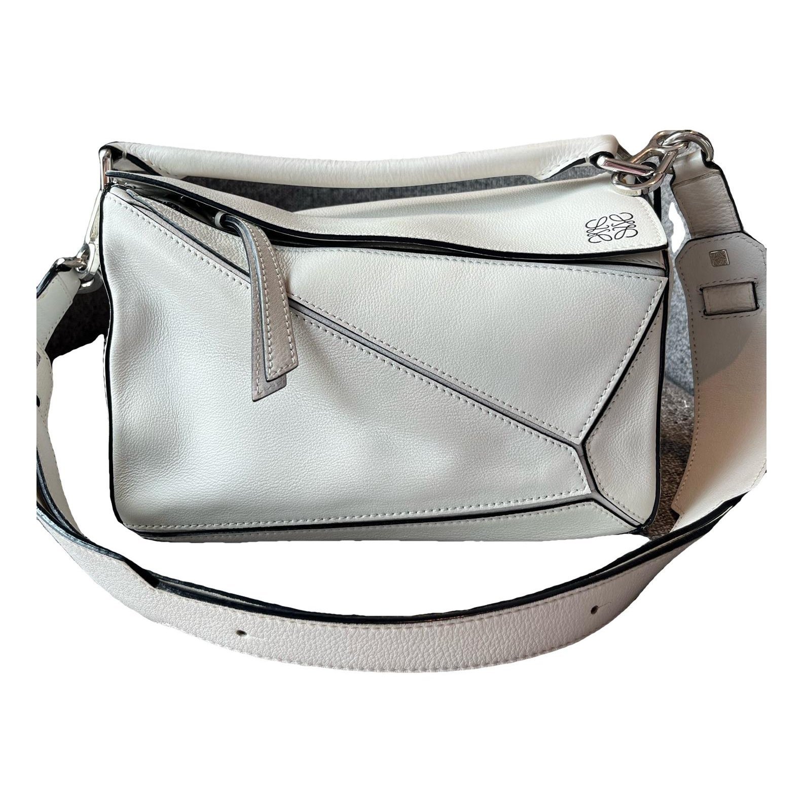 Puzzle leather handbag