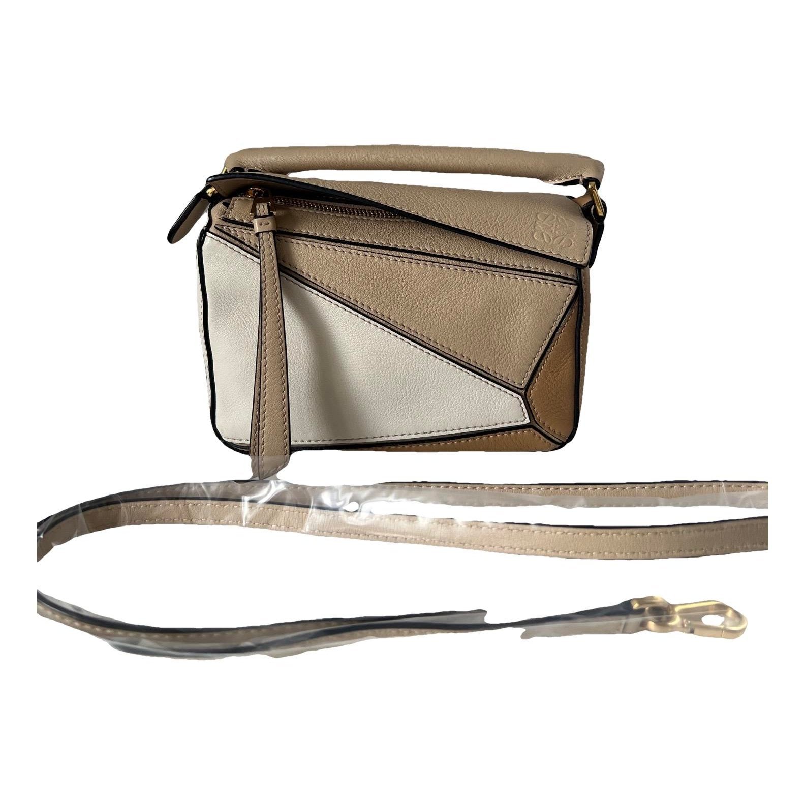 Puzzle leather handbag