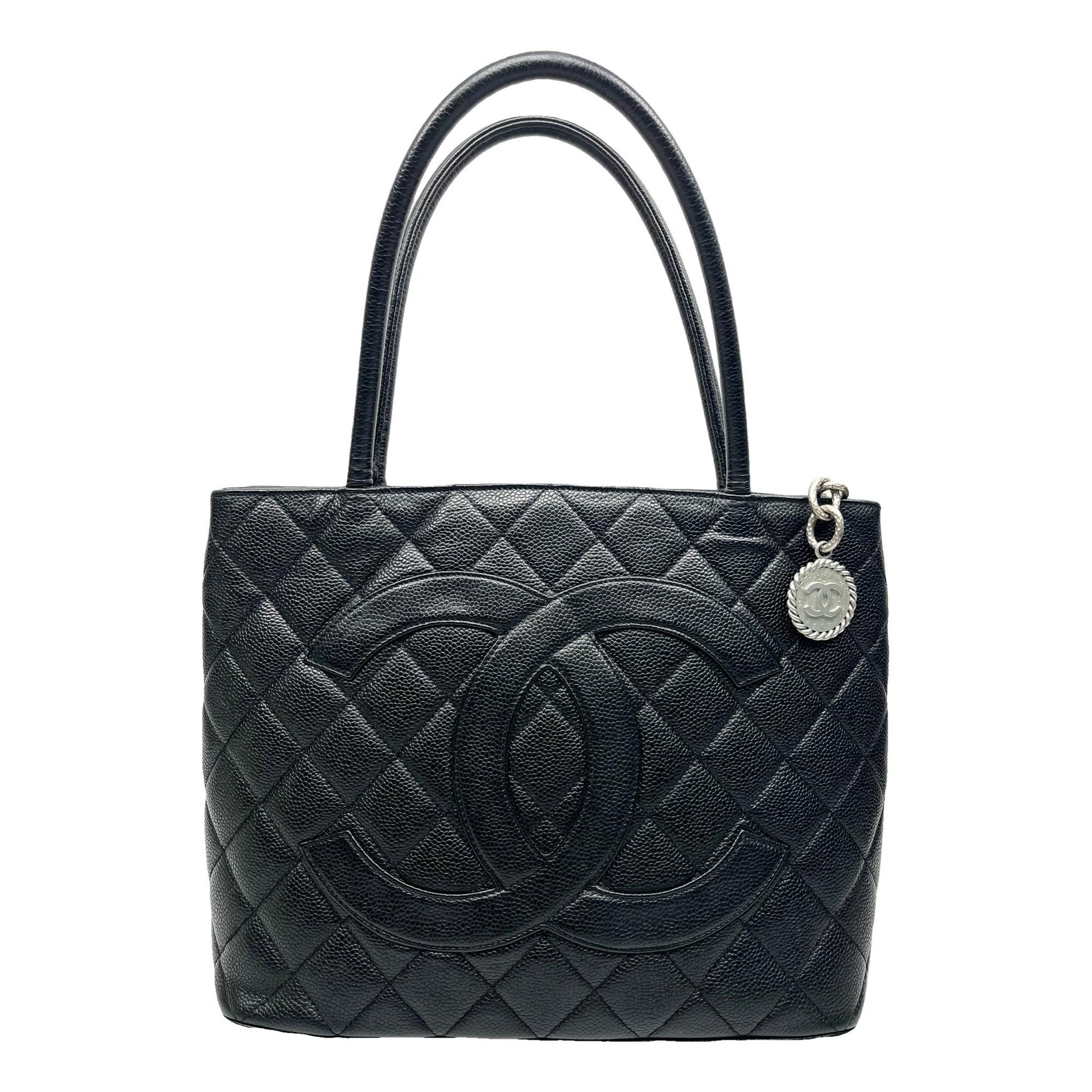 Médaillon leather handbag