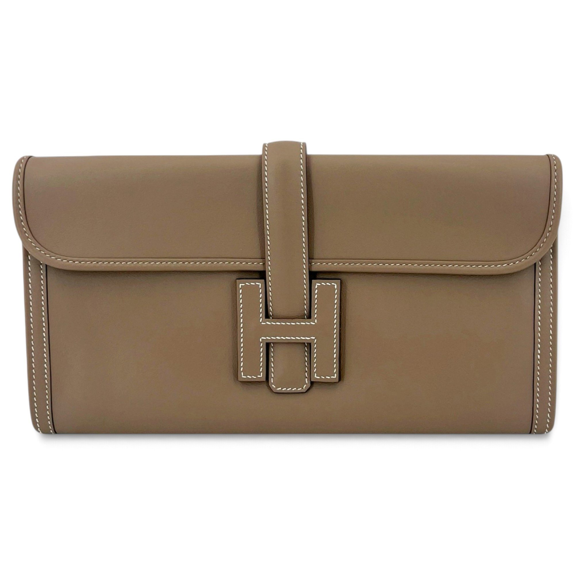 Jige leather clutch bag