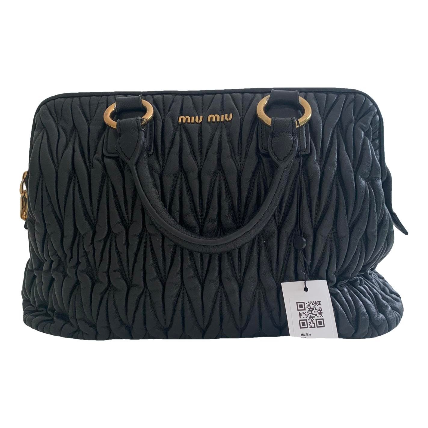 Matelassé leather handbag