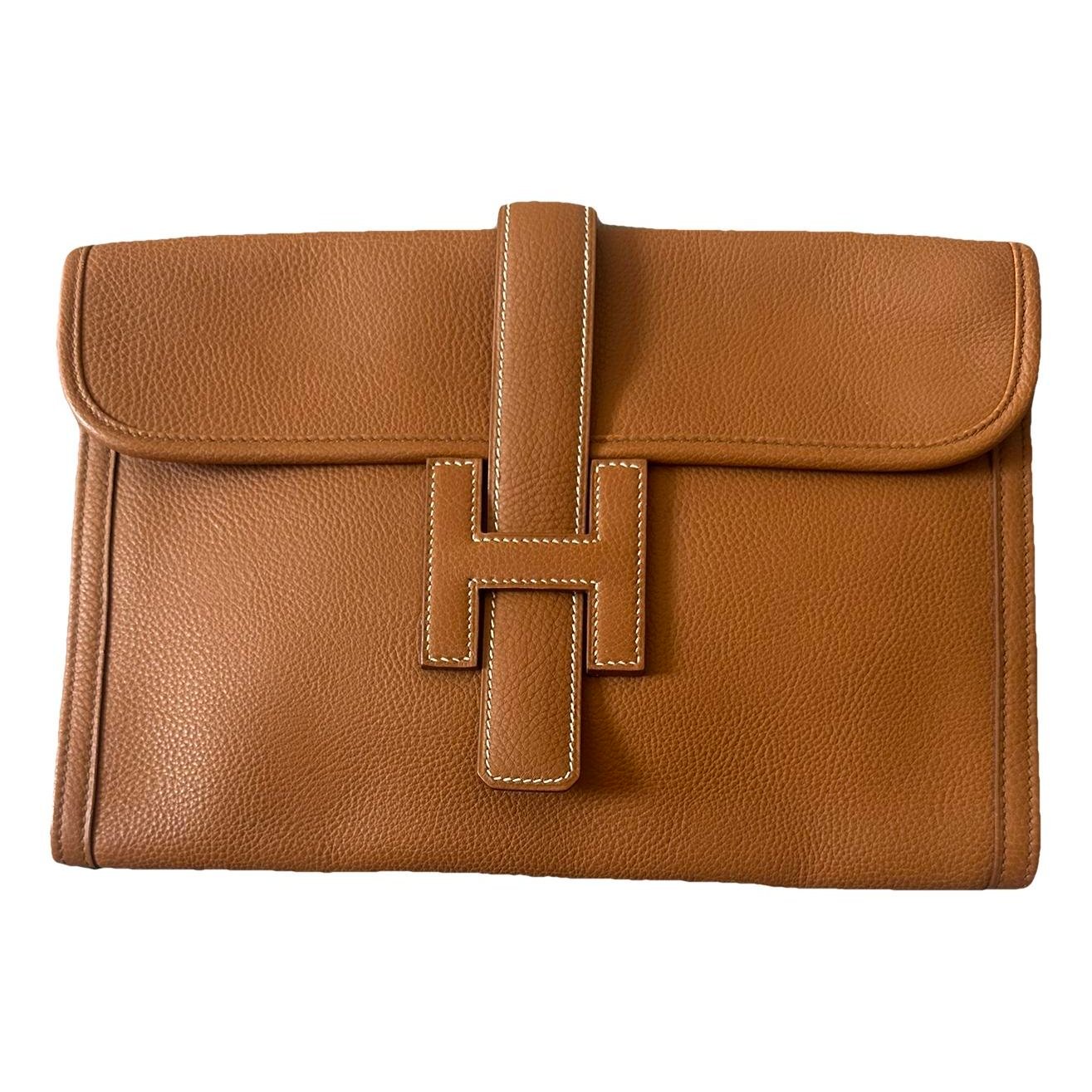 Jige leather clutch bag