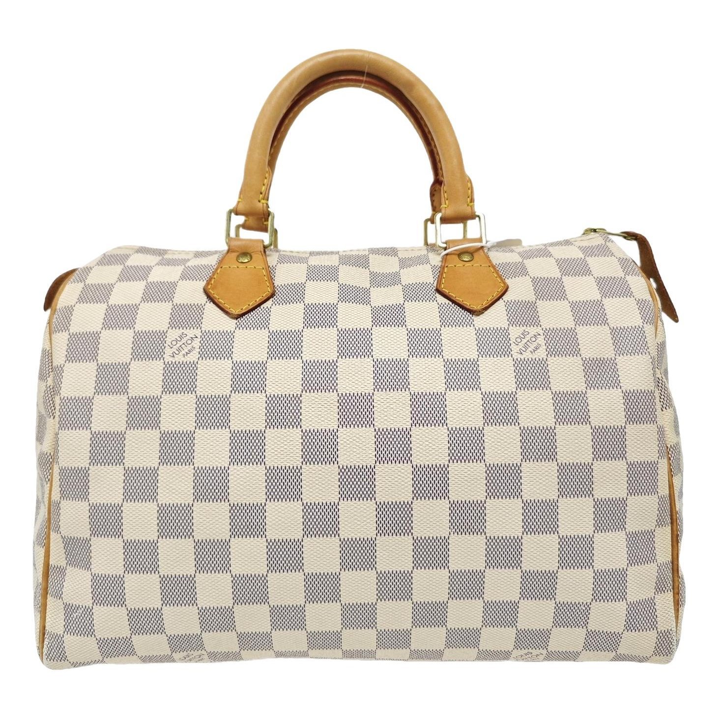 Nano Speedy / Mini HL leather handbag
