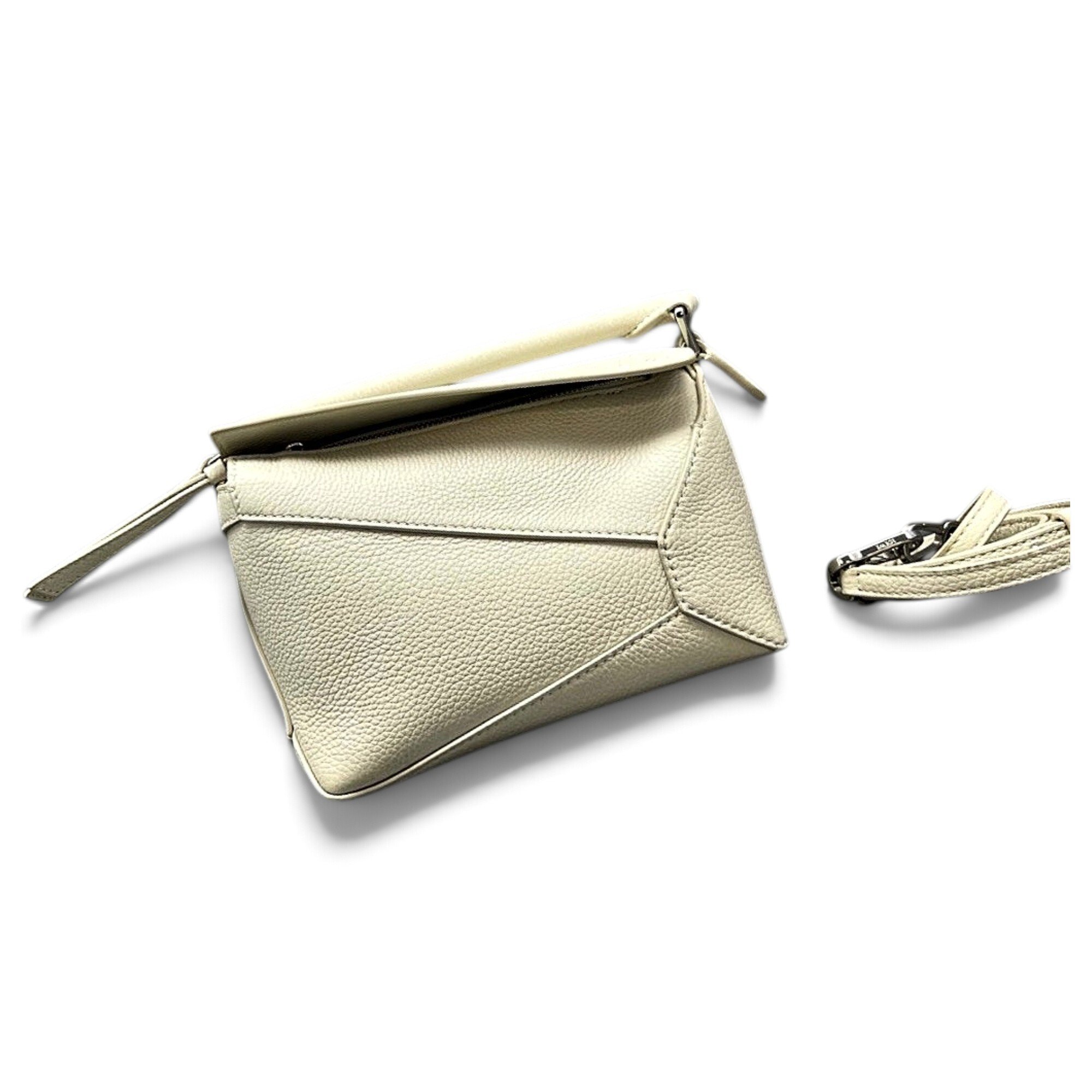 Puzzle leather handbag