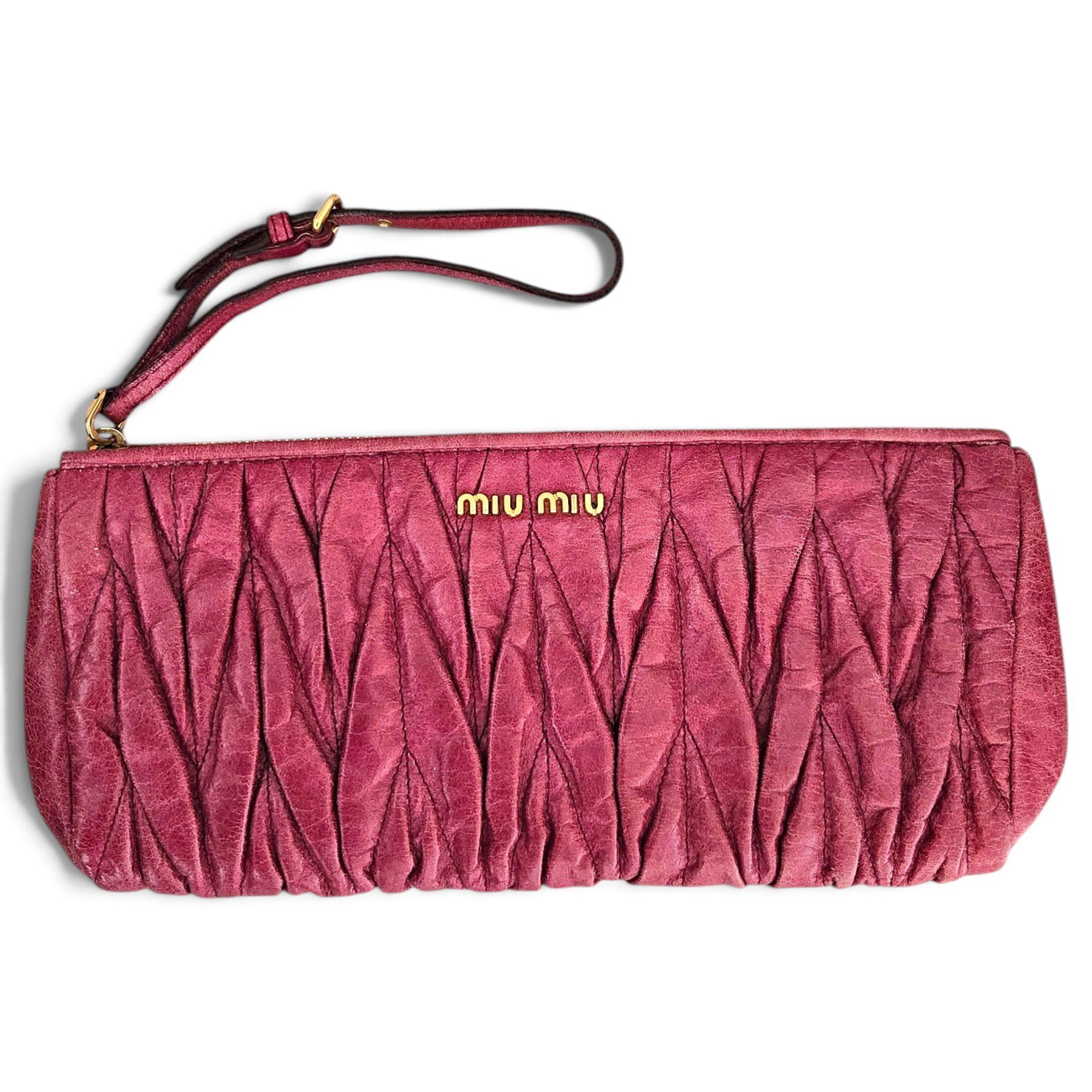 Matelassé leather clutch bag