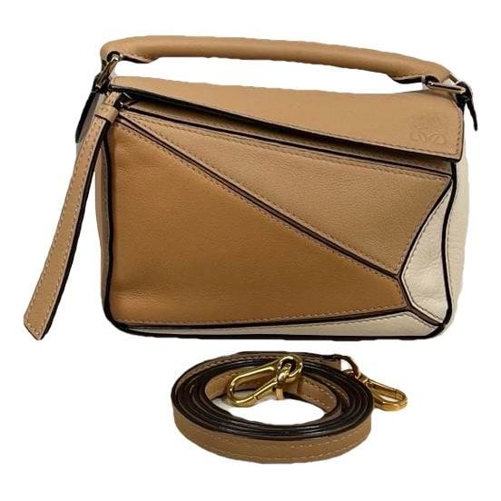 Puzzle leather handbag