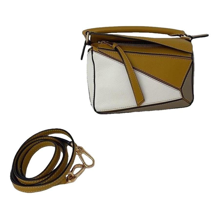 Puzzle leather handbag