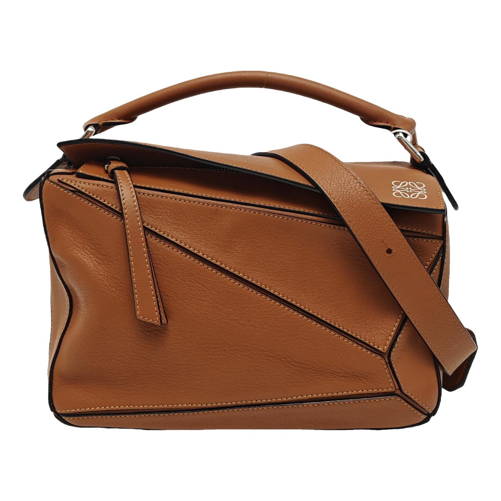 Puzzle leather handbag