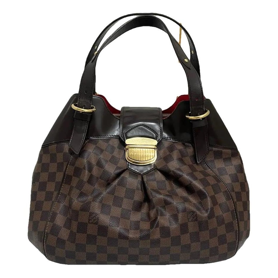 Sistina vinyl handbag