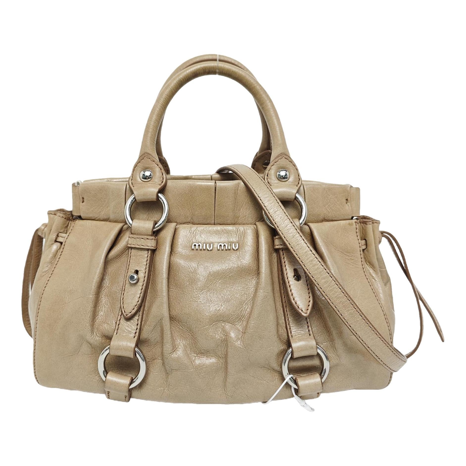 Bow bag leather handbag