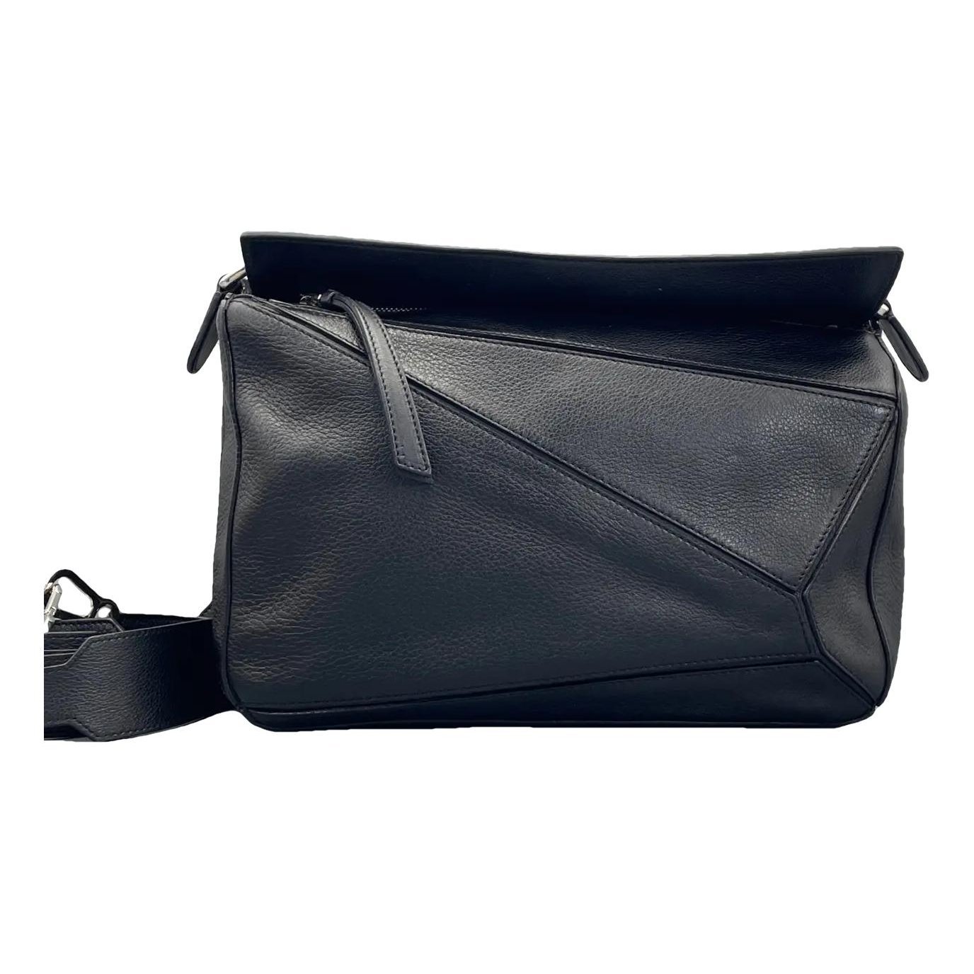 Puzzle leather crossbody bag