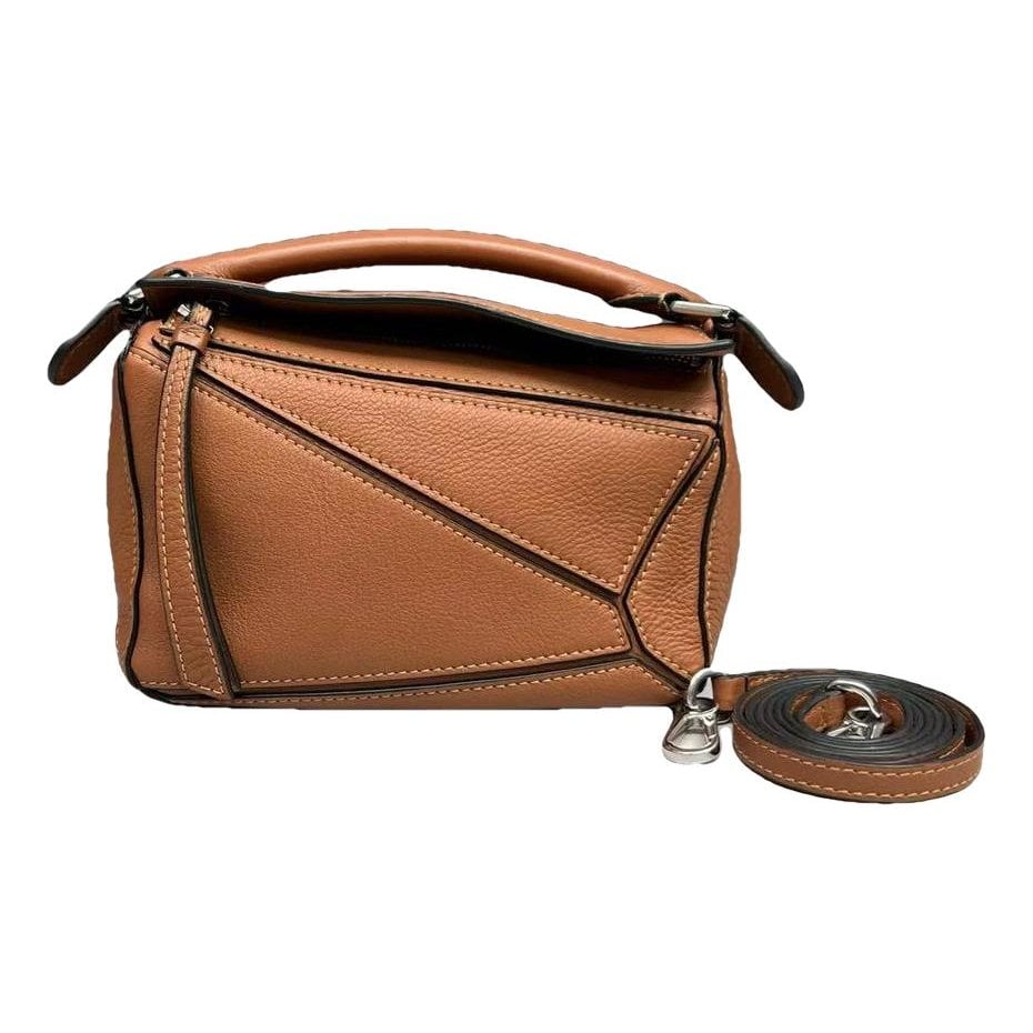 Puzzle leather handbag