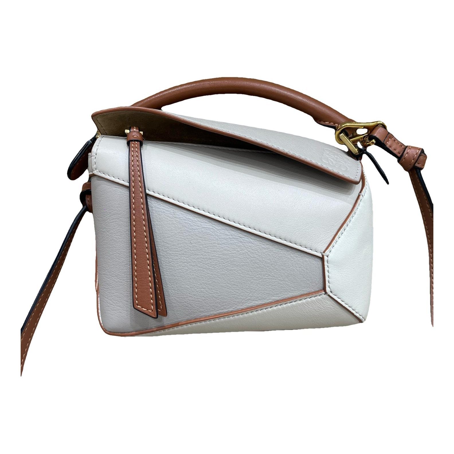 Puzzle leather handbag