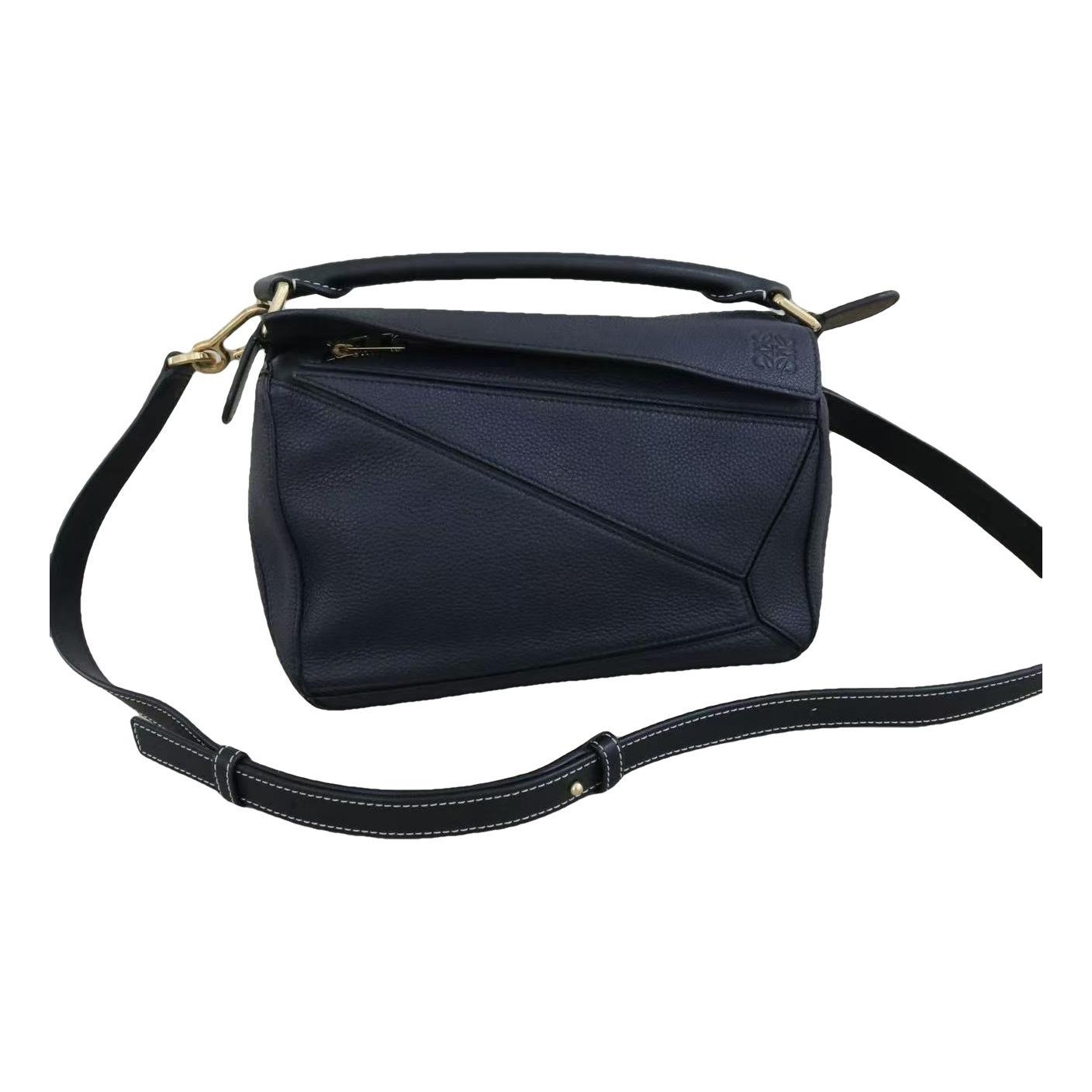 Puzzle leather handbag