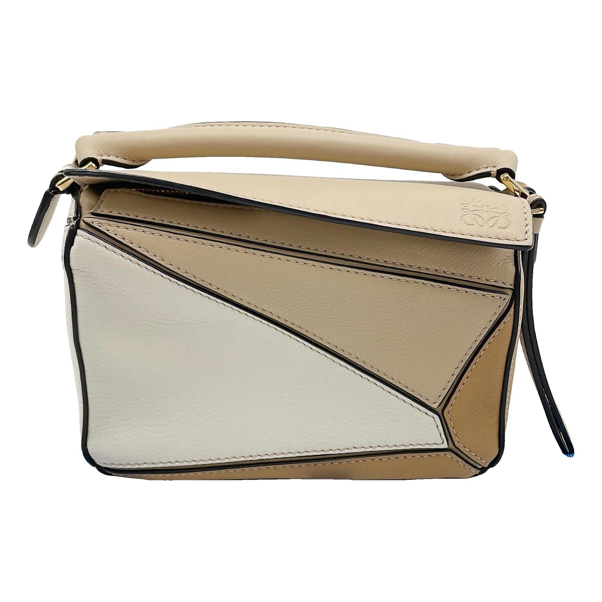 Puzzle leather handbag