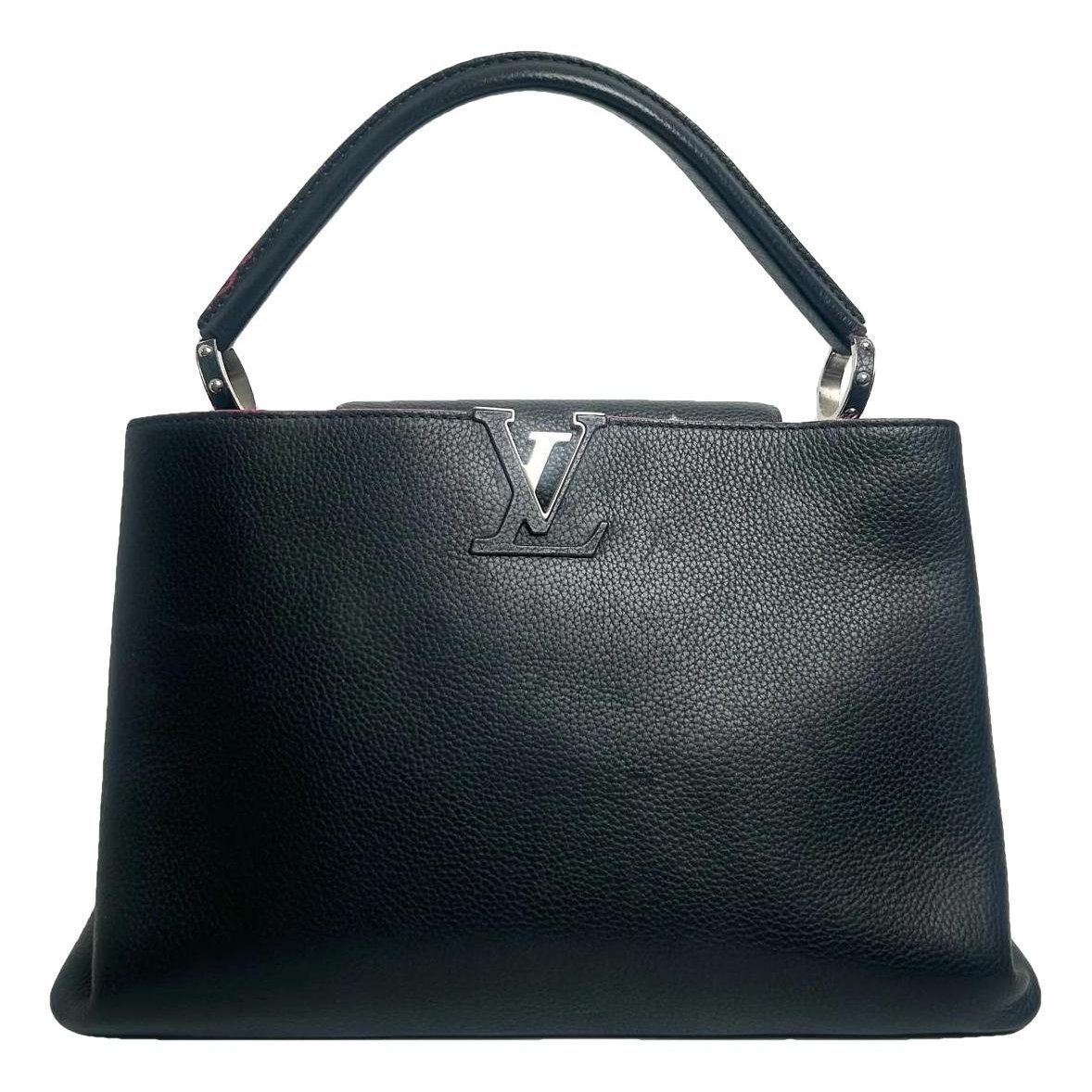 Capucines pony-style calfskin handbag