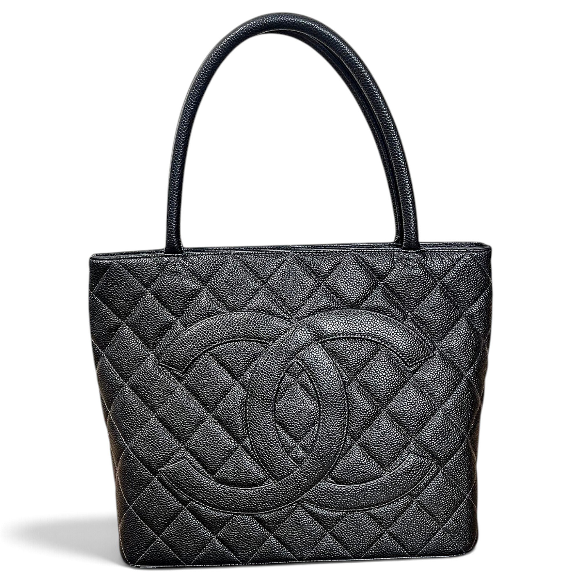 Médaillon leather handbag