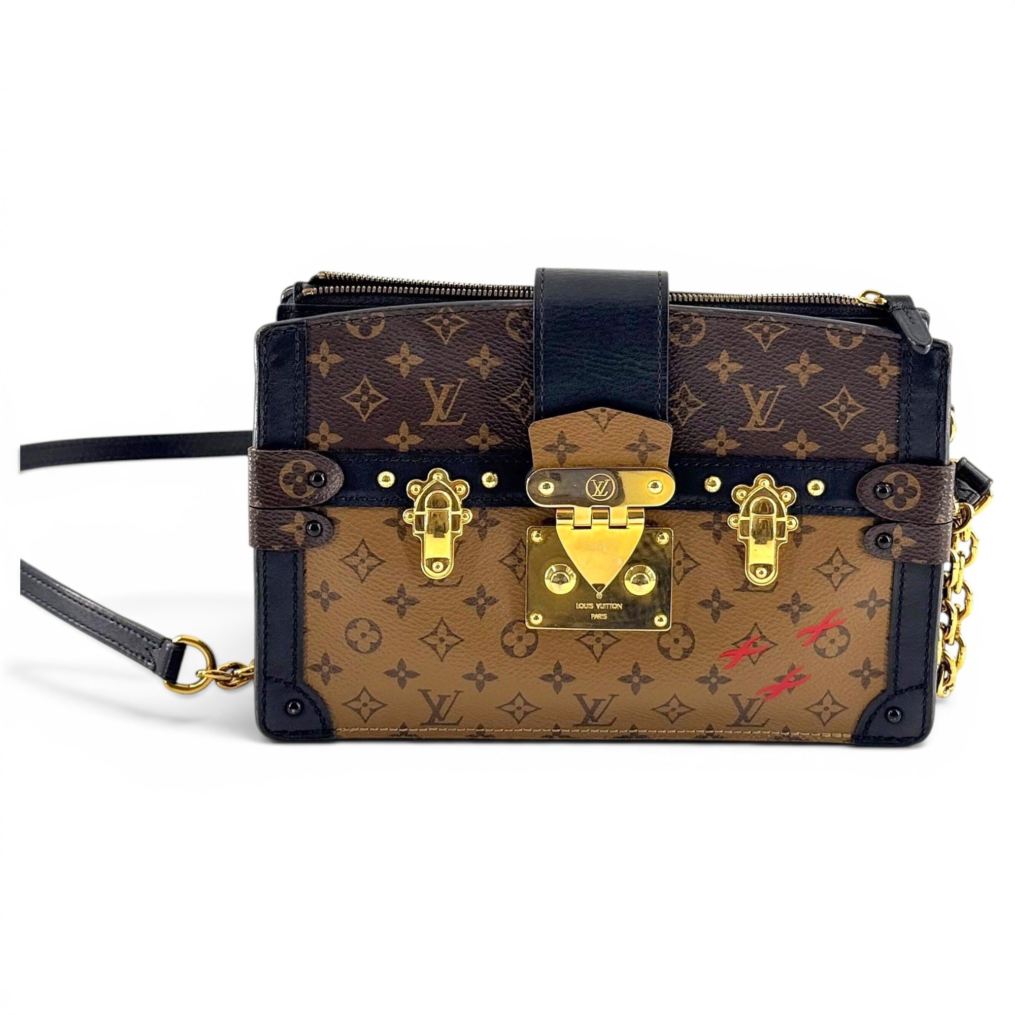 Pochette Trunk leather handbag