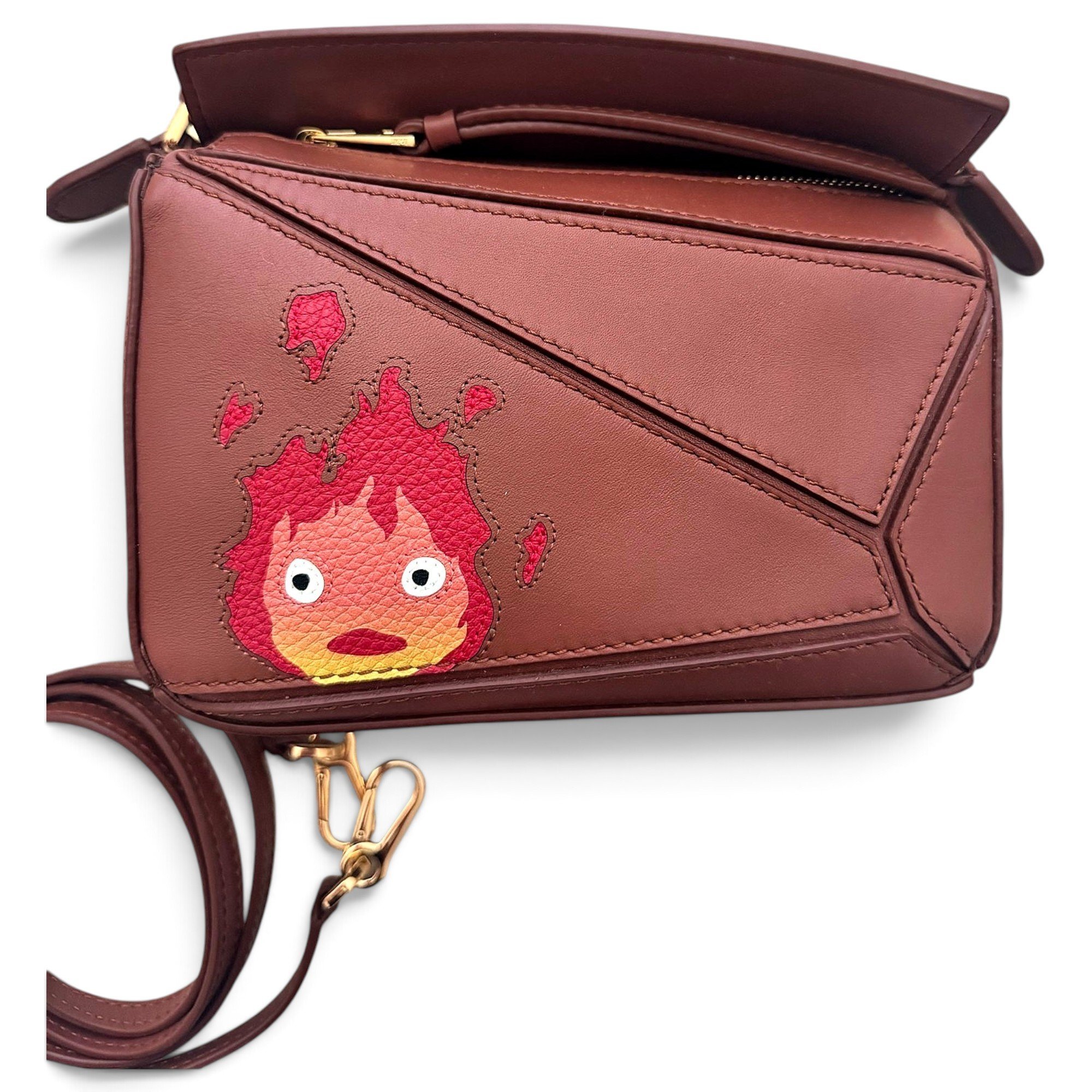 Puzzle leather handbag
