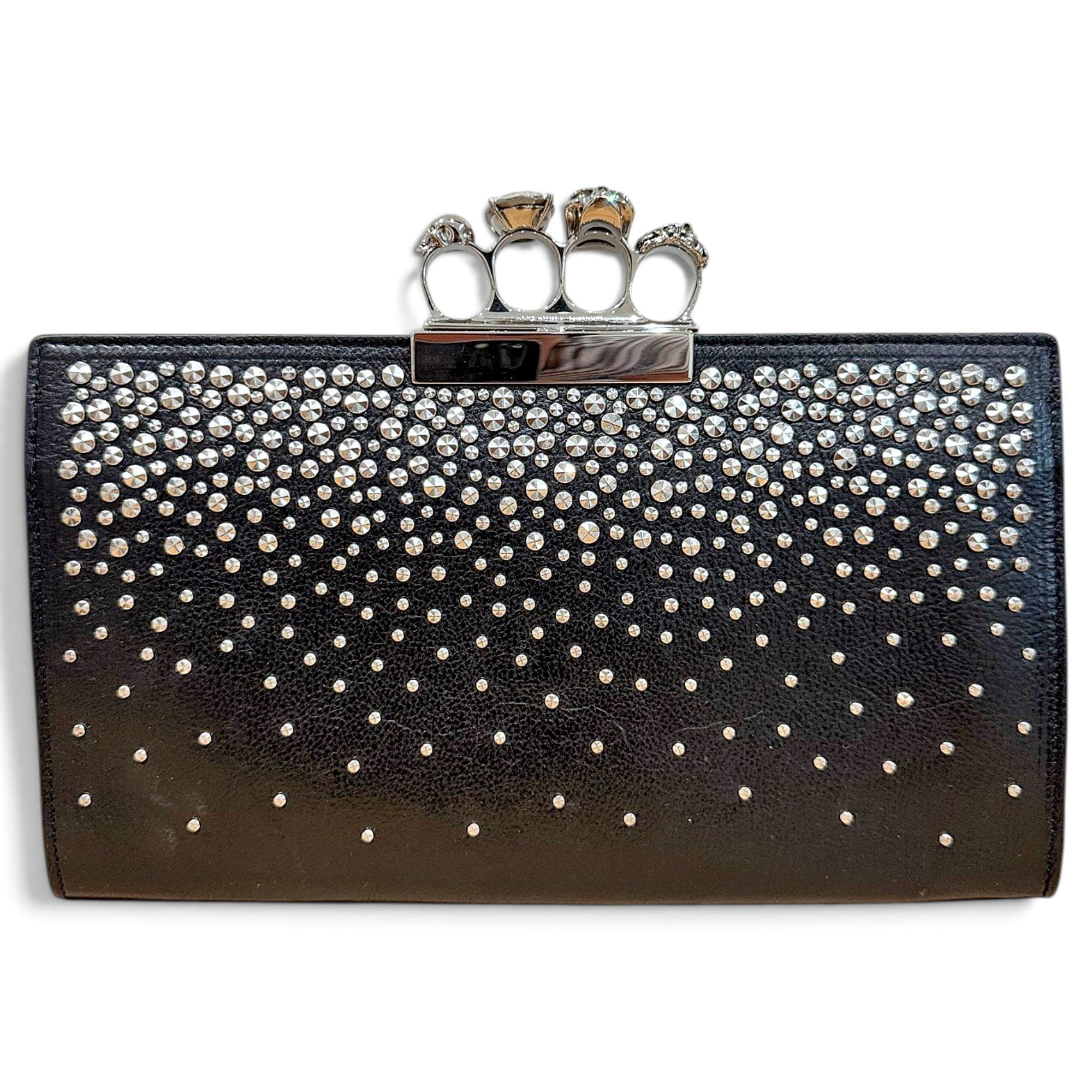 Knuckle leather clutch bag